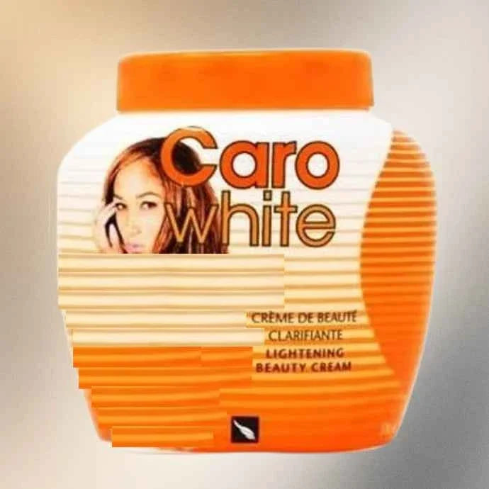 Caro White Beauty Cream with Carrot Oil, 300ml, featuring a white jar with the product label and orange carrot illustrations.