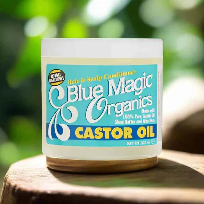 Blue Magic Organics castor oil hair and scalp conditioner in a 12oz bottle, featuring a white cap and blue label.