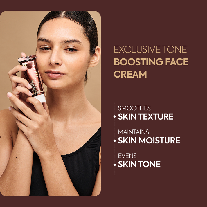 Makari Exclusive skincare cream jar with white lid and embossed logo, showcasing a luxurious cosmetic product for skin brightening.