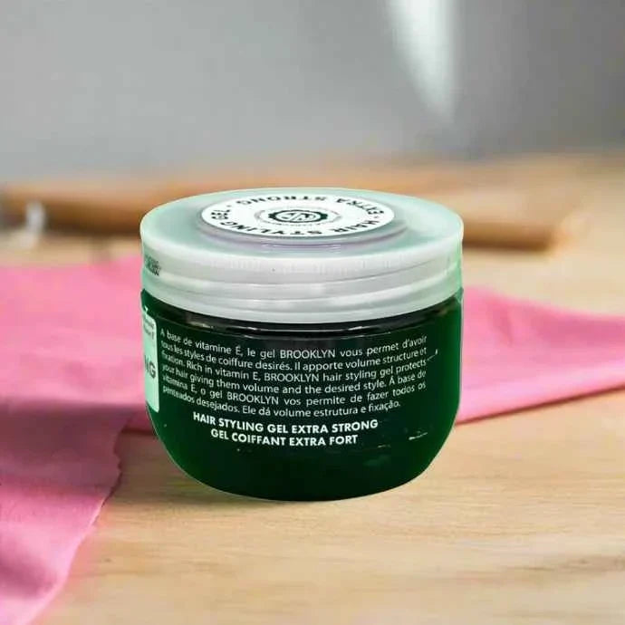 Brooklyn Hair Styling Gel with Vitamin E in a 100ml jar, showing the gel's smooth texture and branding on the container.