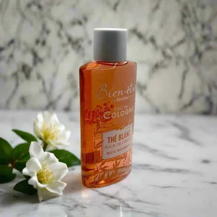Bien-Être White Tea and Cherry Blossom Eau de Cologne 250ml bottle with floral and tea-inspired design.