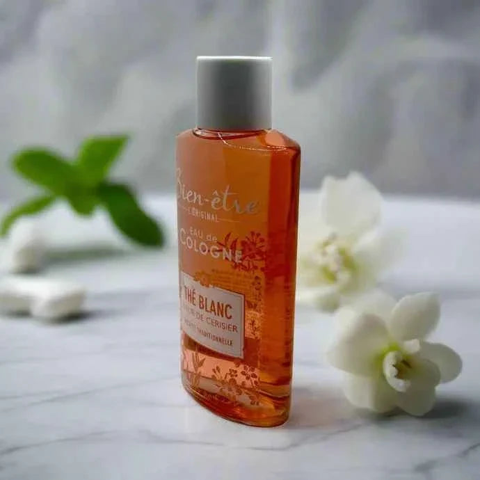 Bien-Être White Tea and Cherry Blossom Eau de Cologne 250ml bottle with floral and tea-inspired design.
