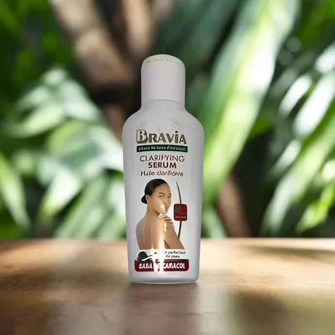 Bravia Vitamin C Facial Serum bottle with dropper, 60ml, showcasing the orange-tinted serum and sleek packaging.