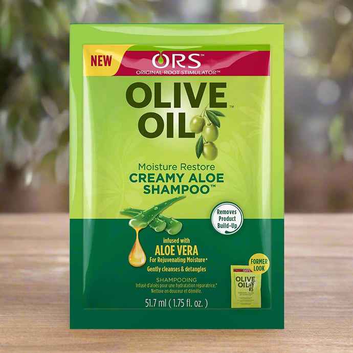 ORS Organic Root Stimulator Olive Oil Creamy Aloe Shampoo in 1.75 oz bottle, showing the creamy shampoo formula and packaging.