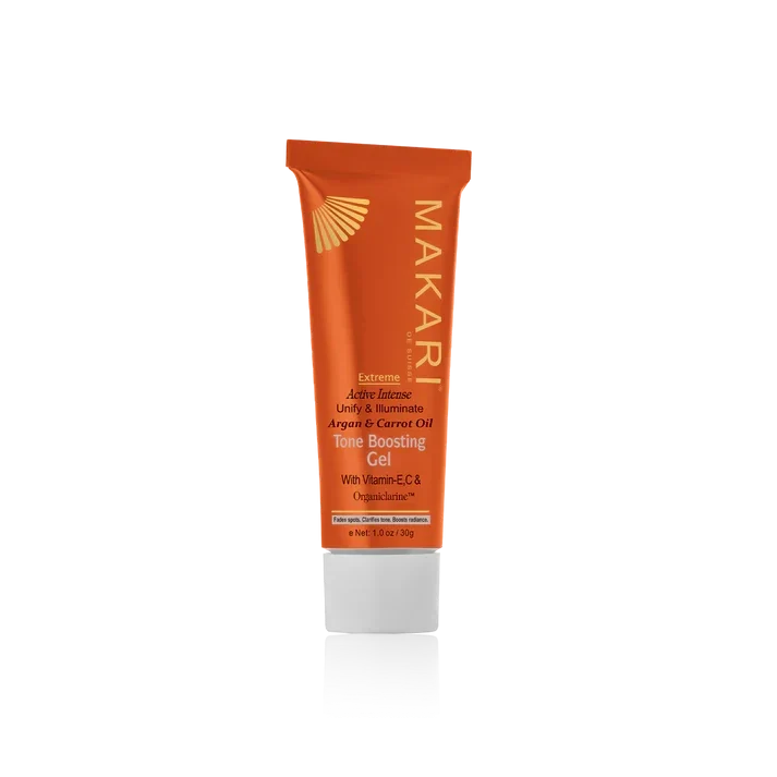 Makari Extreme Argan and Carrot Oil bottle with dropper, natural skincare product for hair and skin care.