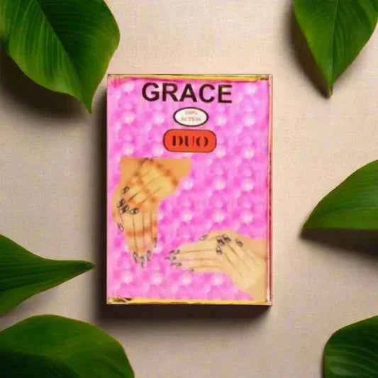 Grace Duo skincare set featuring a serum and lotion for anti-spot treatment, with sleek bottles and minimalist design.
