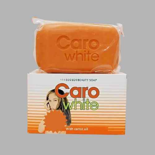 Caro White Beauty Soap 7 oz nourishing cleansing bar with white and pink packaging, showcasing the soap bar on a clean surface.