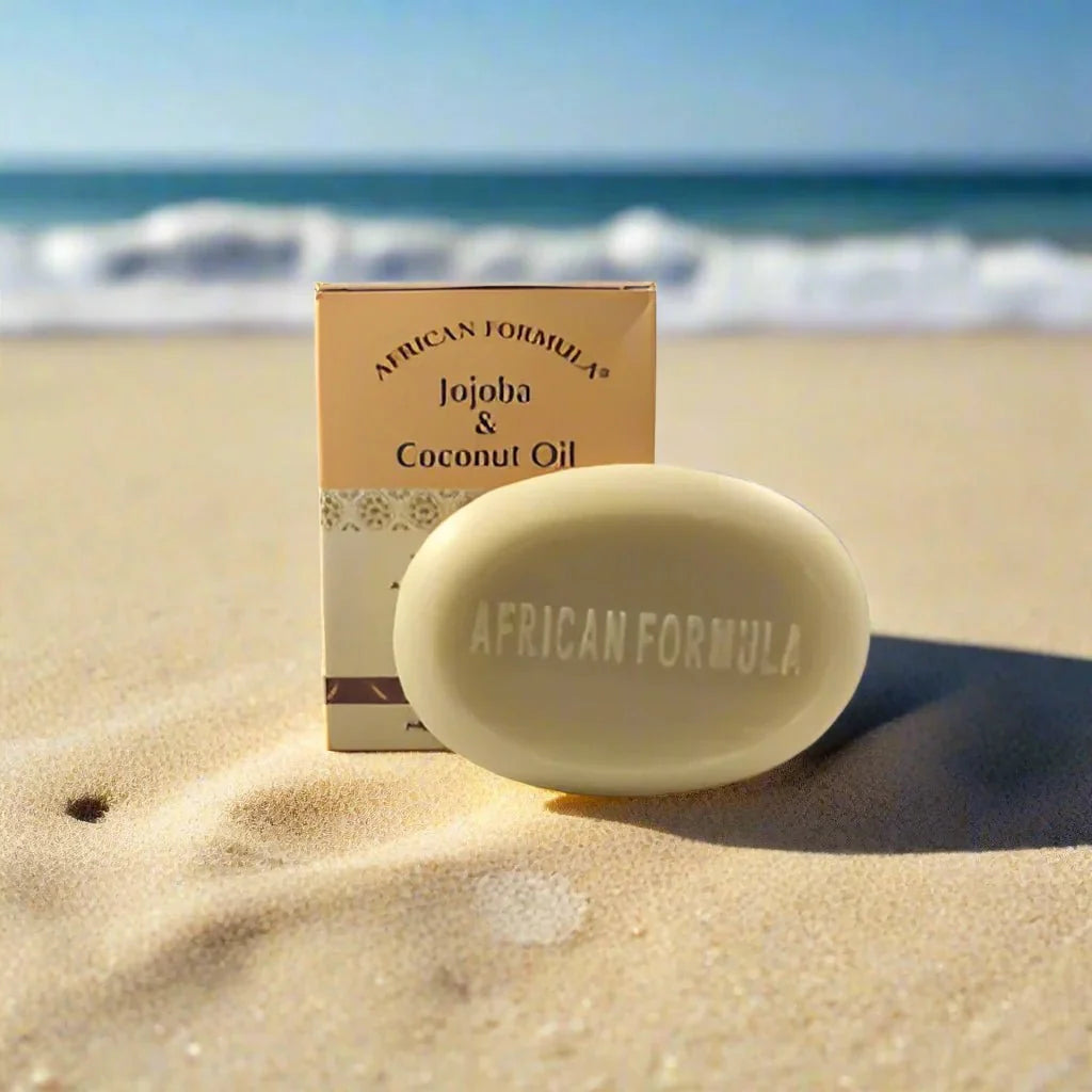 African Formula Jojoba and Coconut Moisturizing Soap 3.5 oz bar showing the soap with natural ingredients.