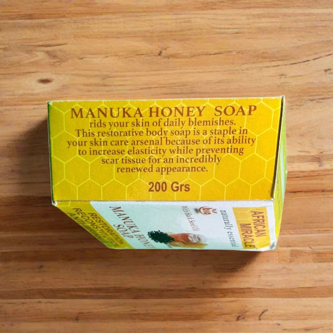 African Miracle Blackseed Honey Soap 200g bar showing textured blackseed and honey ingredients in natural soap form.