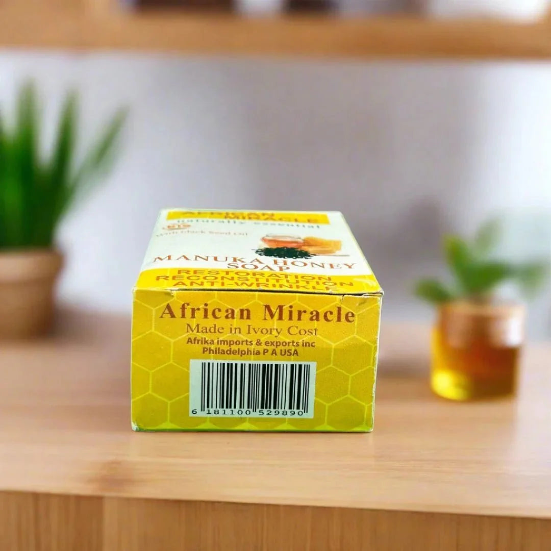 African Miracle Blackseed Honey Soap 200g bar with natural ingredients, showcasing a textured soap with blackseed and honey elements.