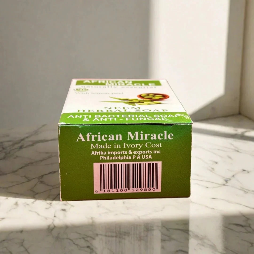 African Miracle Neem Herbal Soap 200g bar with natural neem leaves and herbal ingredients, ideal for skin cleansing and refreshment.