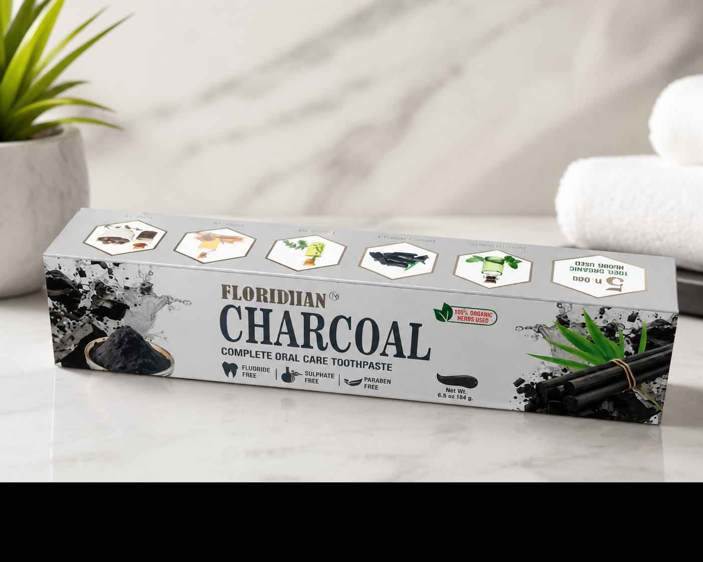 Charcoal Complete Oral Care Toothpaste in 164g tube, featuring black charcoal formula for whitening and freshening teeth.