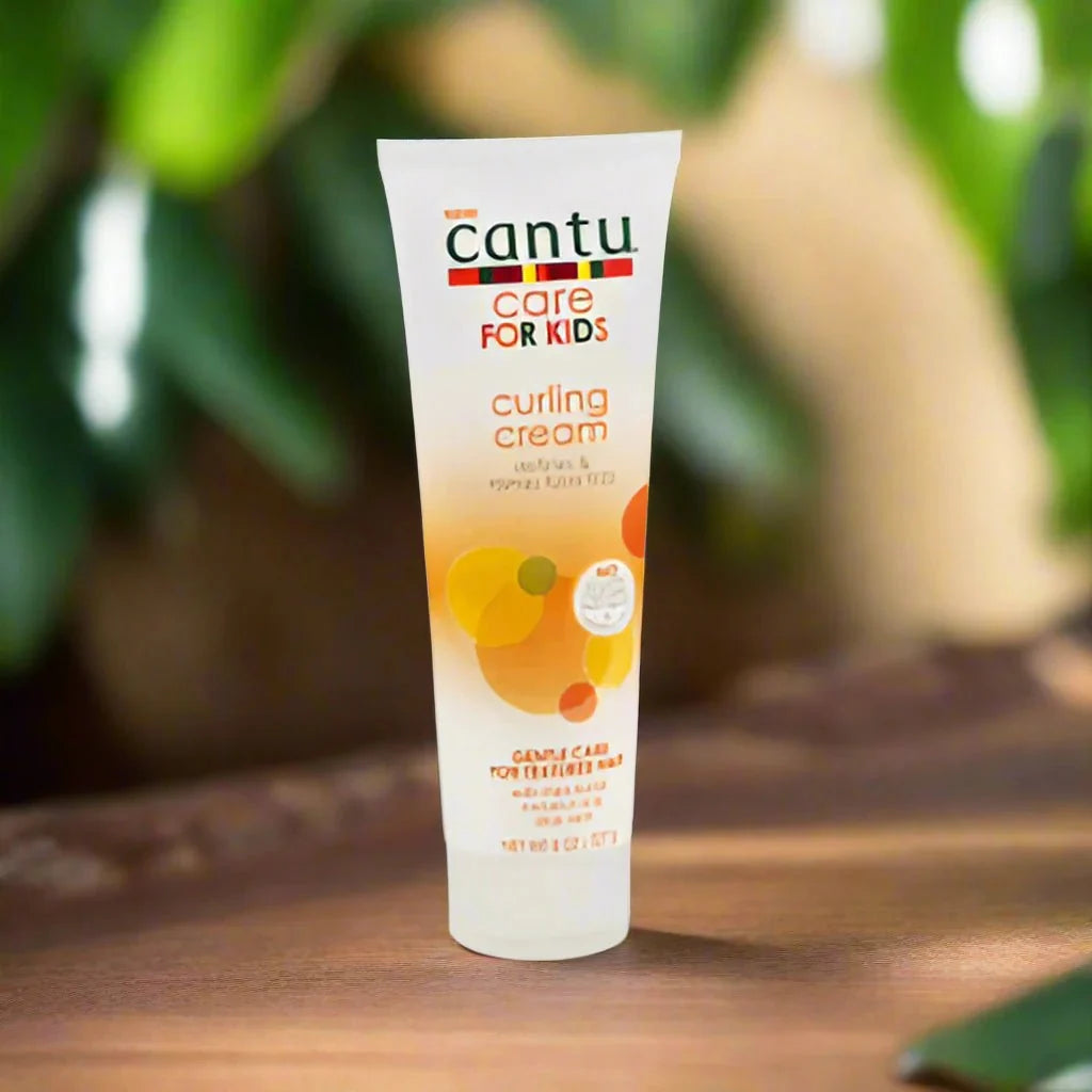Cantu Care for Kids Curling Cream tube, 8oz, showing the product packaging and branding designed for children's curly hair.