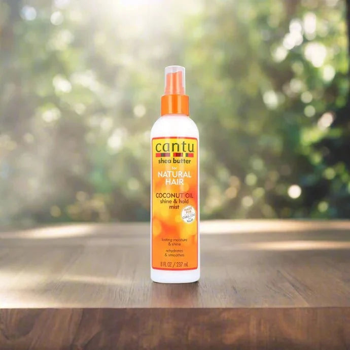Cantu Shea Butter Coconut Spray Mist in 8oz bottle, featuring a spray nozzle and label with coconut and Shea butter imagery.