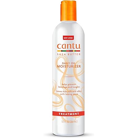 Cantu Shea Butter Daily Oil Moisturizer in a 385 ml bottle, featuring a pump dispenser and creamy texture for hair hydration.