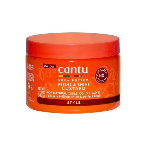 Cantu Shea Butter Define & Shine Custard 12oz jar with product label and clear lid, designed for hair styling and shine.