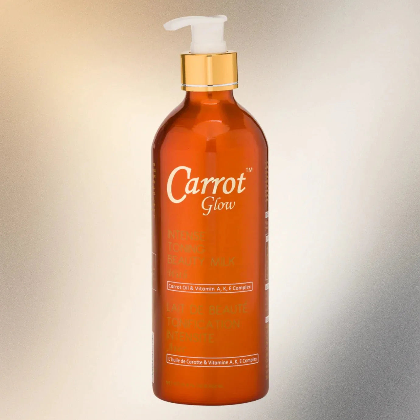 Carrot Glow Beauty Milk bottle, 16.8 oz, featuring vibrant orange packaging with carrot illustrations and a clear pump dispenser.