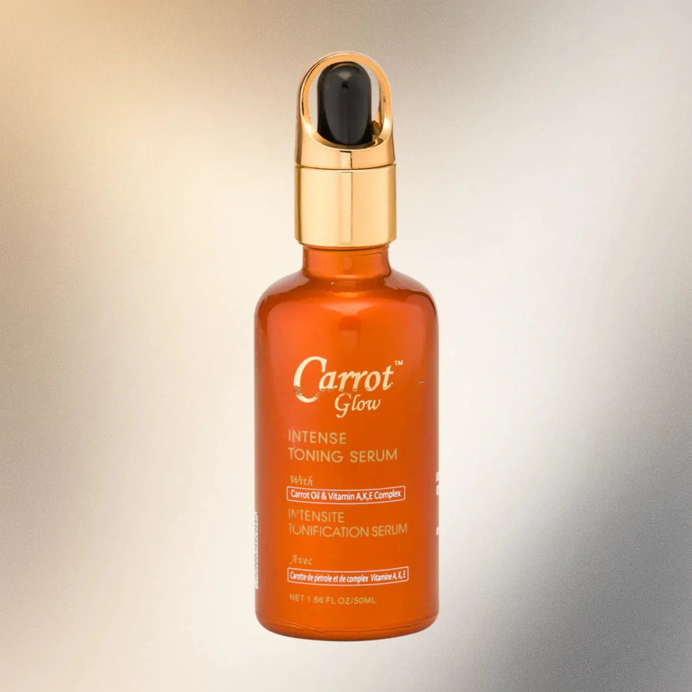 Carrot Glow Serum in 1.66 oz bottle, featuring vibrant orange serum with a dropper for brightening and nourishing skin.