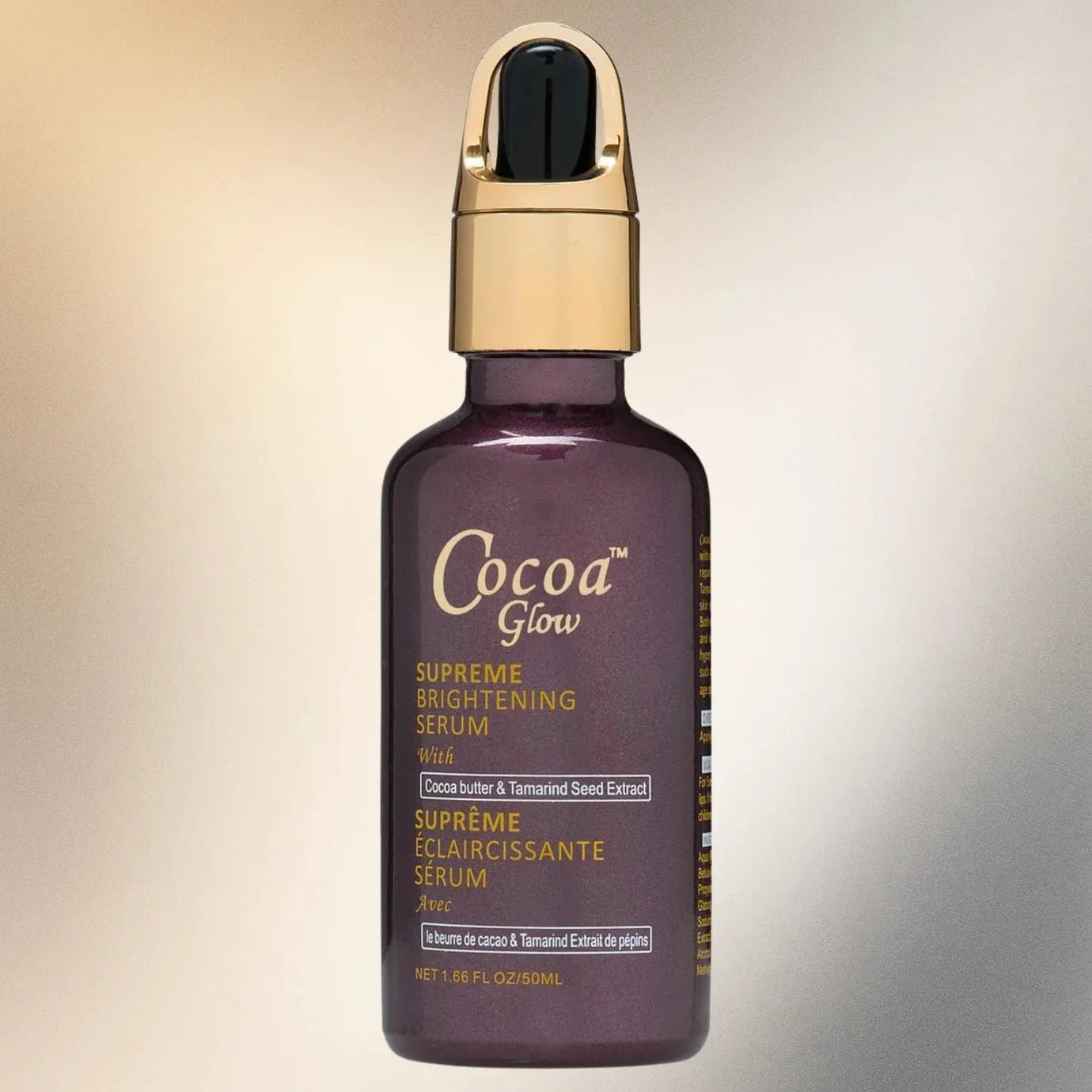 Cocoa Glow Supreme Serum 1.66 oz bottle with a sleek design, featuring the Cocoa Glow branding on the label.