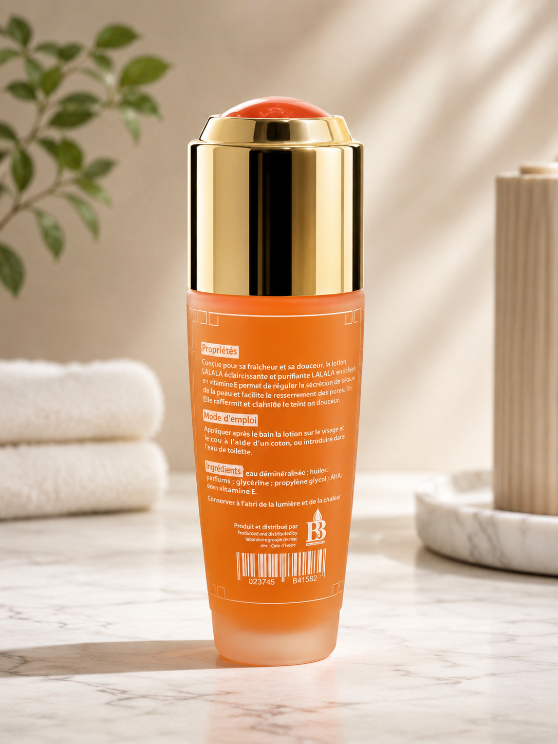 LaLaLa Softening Beauty Oil with Vitamin E in a 3.5 fl oz bottle, featuring a clear glass container and a pump dispenser.