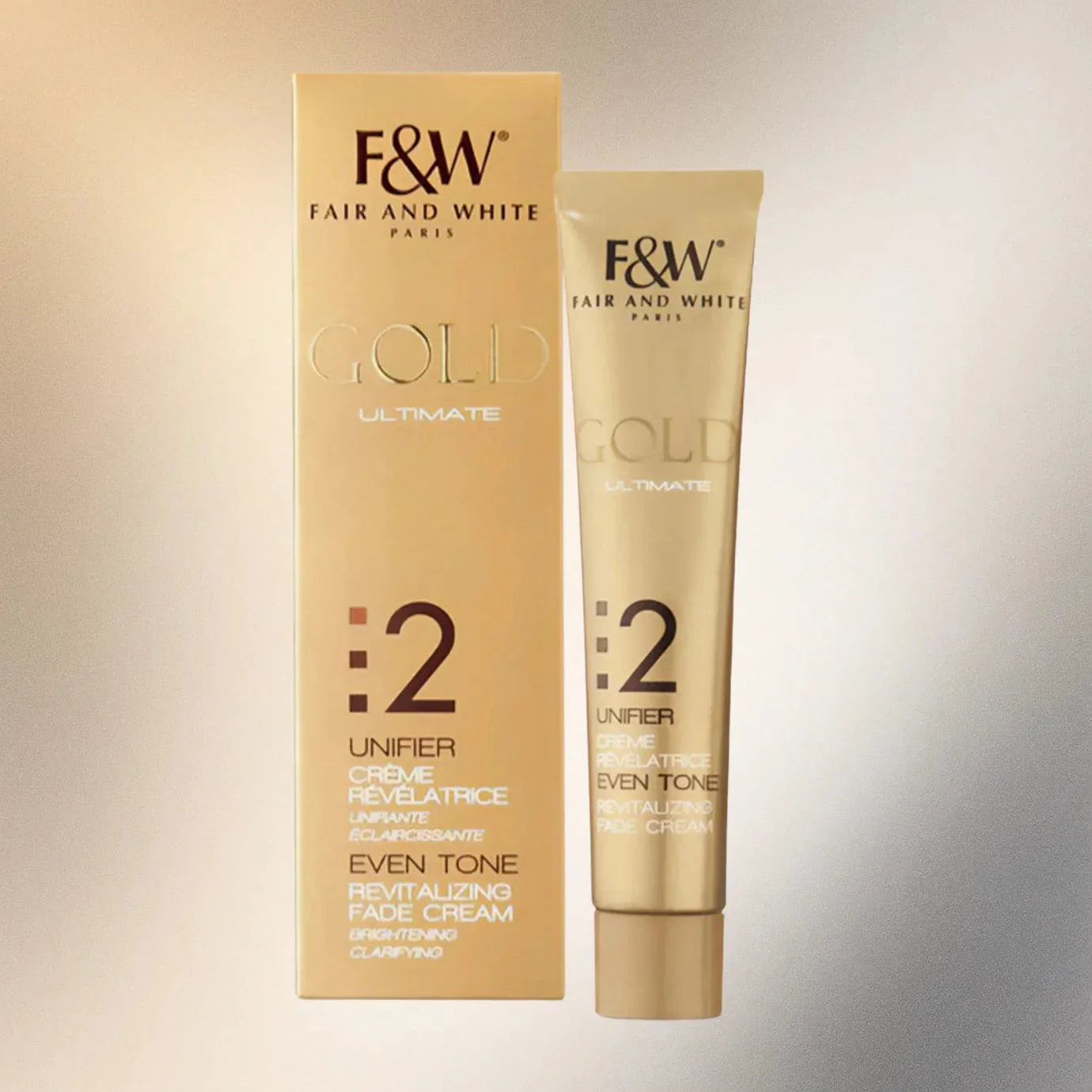 Fair & White Gold #2 revitalizing face cream with Vitamin C, 1.7 oz, showing the cream jar with golden packaging and label.