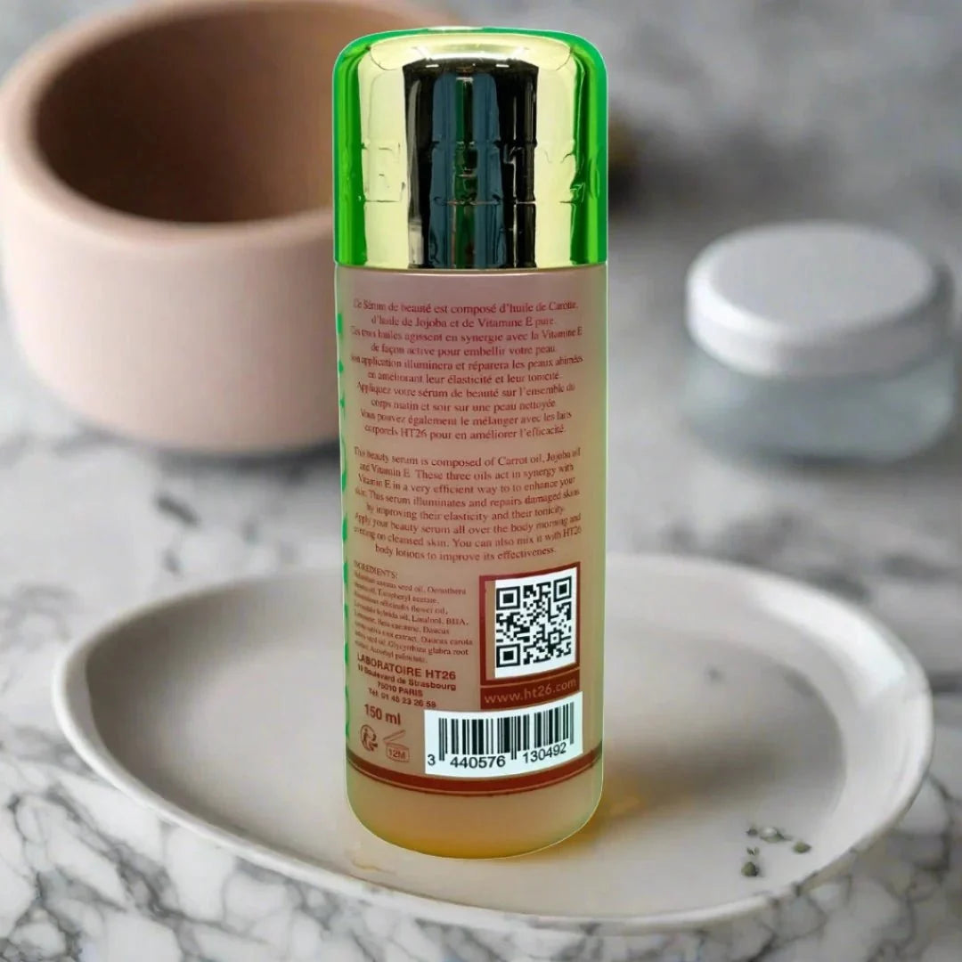 HT26 Carrot Oil Beauty Serum in 150 ml bottle, featuring vibrant orange carrot oil for skincare and nourishing benefits.