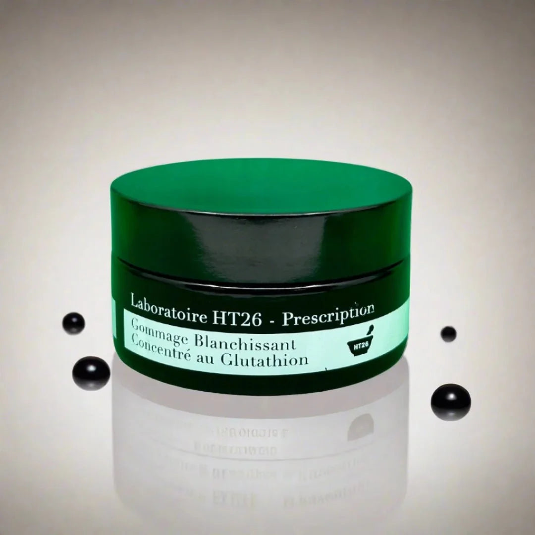 HT26 Glutathione Scrub Concentrate in a sleek bottle, showcasing its skincare product design for brightening and exfoliation.