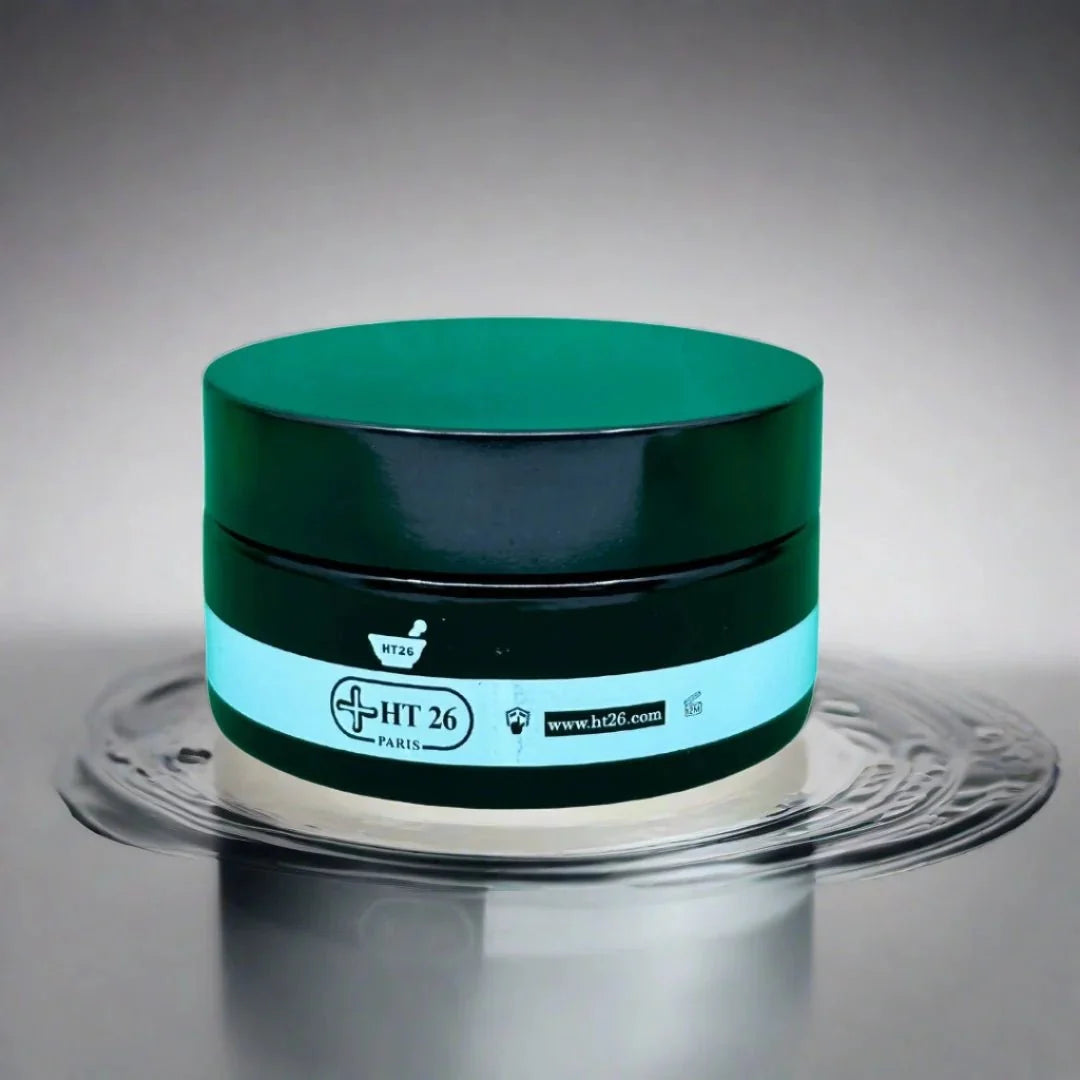 HT26 Glutathione Scrub Concentrate in a clear jar with a creamy, exfoliating texture and a pump dispenser for skincare application.