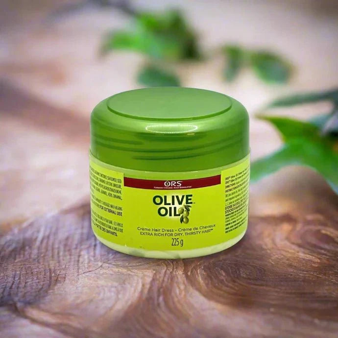 ORS Olive & Castor Oil Enriched Hair Cream in 225g jar, smooth creamy texture for nourishing hair care.