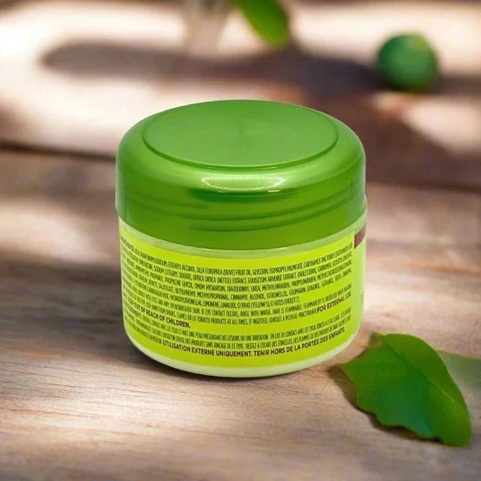 ORS Olive & Castor Oil Enriched Hair Cream in 225g jar showing the creamy texture and olive and castor oil ingredients.