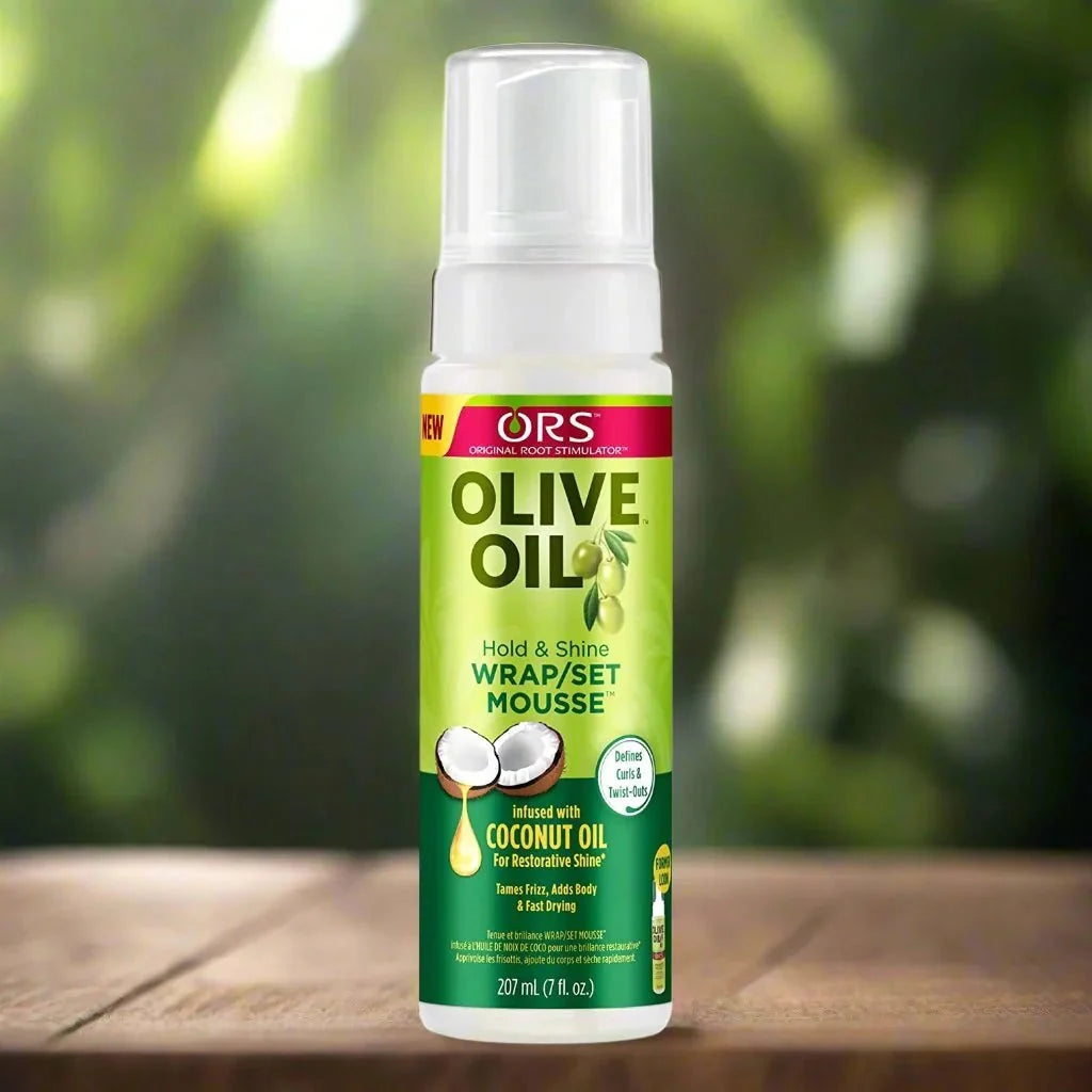 ORS Olive Wrap and Set Mousse 7 oz jar with olive oil formula, showcasing the hair styling product in a clear container