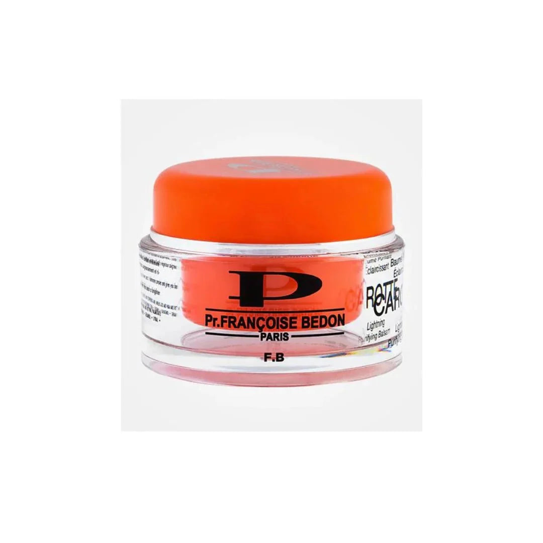 Pr. Francoise Bedon Carrot Balm with Carrot Oil in a jar, showcasing the nourishing skincare product with fresh carrots in the background.