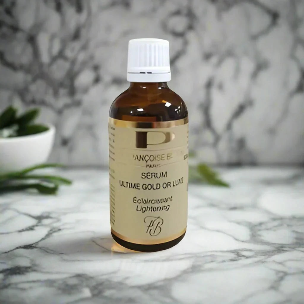 Pr. Francoise Bedon Ultime Gold Luxe Serum 50ml in a glass bottle with a gold cap, showcasing a luxurious skincare product.