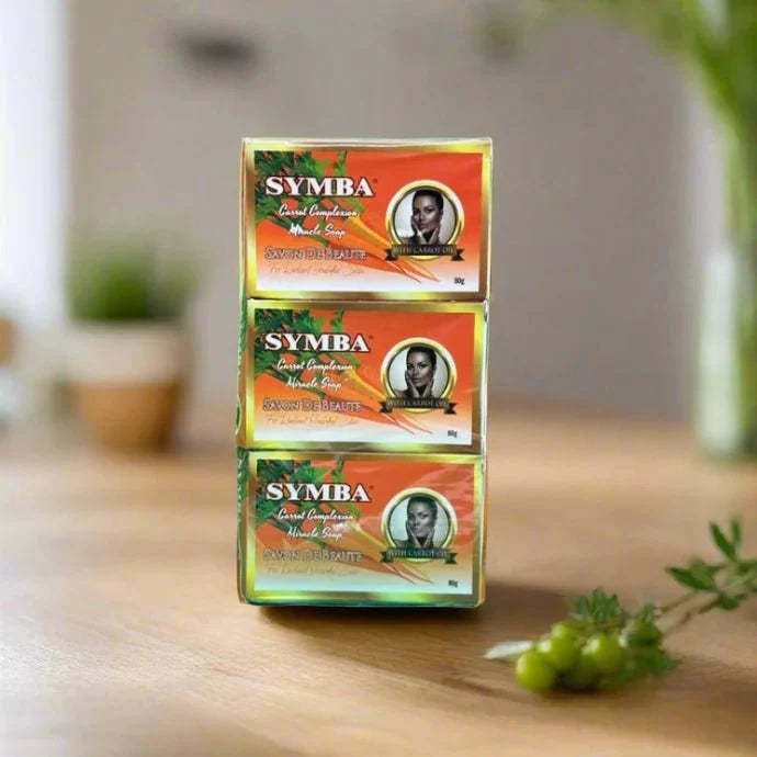 Six Symba Carrot Complexion Soaps, 80g each, displayed in a pack with fresh carrot imagery on the packaging.